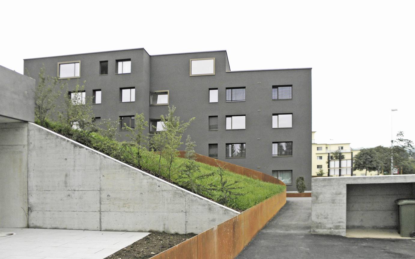 Wohnanlage Bachm&auml;ttli Fertigstellung Terrassenanlage Unterbringung Entsorgung Sichtbeton